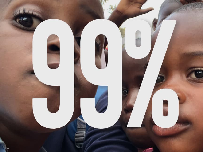 Two children's faces with 99% overlaid — 99% of every donation reaches the kids